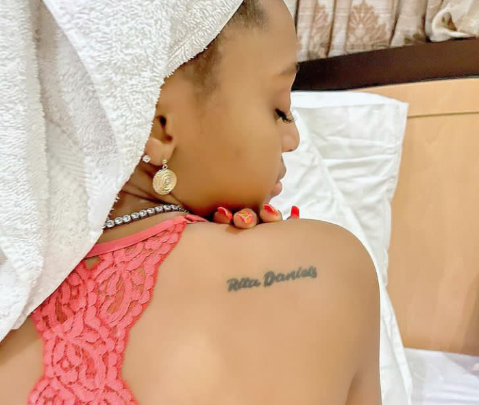 Regina Daniels unveils Rita Daniels' tattoo on her back 