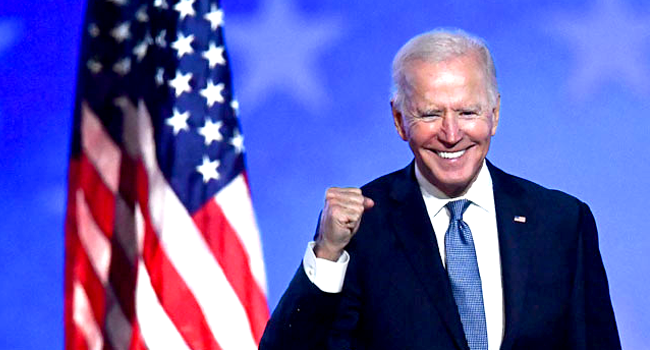Democratic presidential nominee Joe Biden gestures after speaking during election night at the Chase Center in Wilmington, Delaware, early on November 4, 2020. ANGELA WEISS / AFP