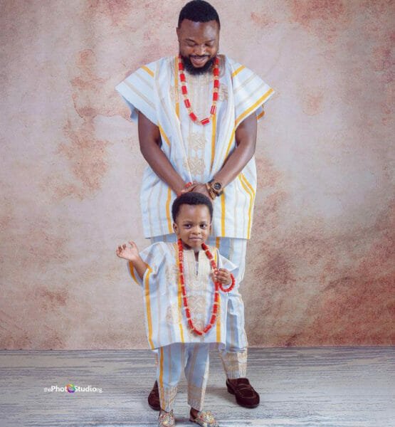 Kola Ajeyemi twins with son, Ire