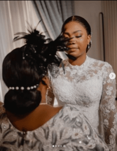 “Nothing beats a mothers love” – Mercy Chinwo tear up as her mother prays for her (photos + video)